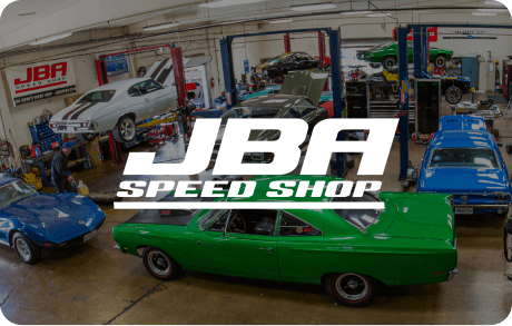 JBA Speed Shop logo over an image showcasing the inside of JBA's garage